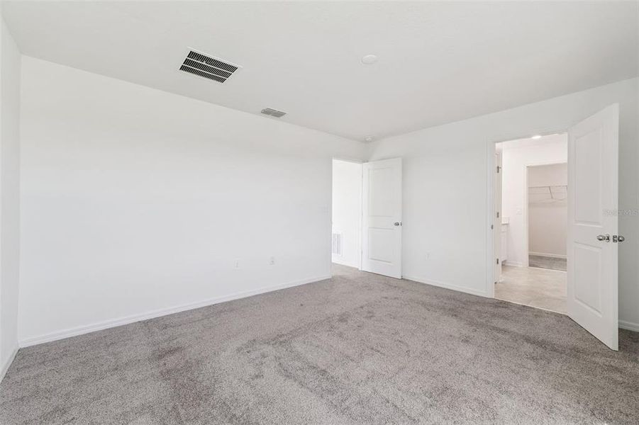 Spacious, unfurnished interior of a new home in Peace Creek Reserve: Legacy Collection, Winter Haven (Image 9). Spacious, unfurnished interior of a new home in Peace Creek Reserve: Legacy Collection, Winter Haven (Image 9).