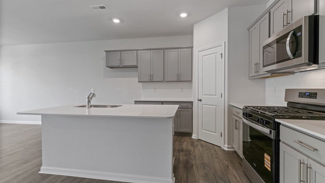 Furnished interior view inside a new home in Chapel Townes, Raleigh (Image 4). Furnished interior view inside a new home in Chapel Townes, Raleigh (Image 4).