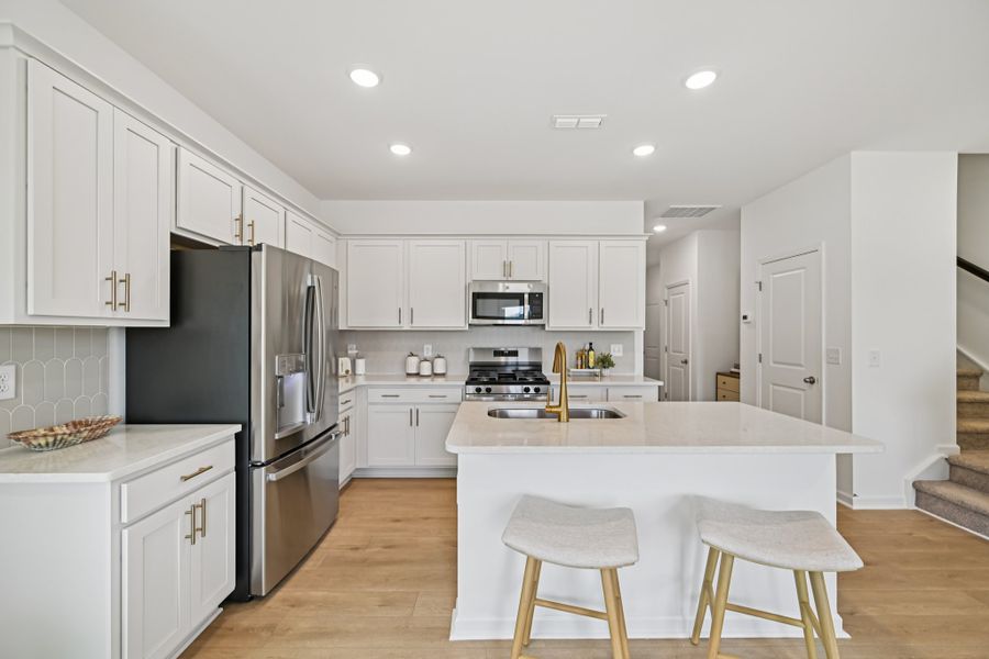 Representative furnished interior of a home built from the Camellia by Ashton Woods in Towns at Crescent Mills, Wilson's Mills (Image 5).