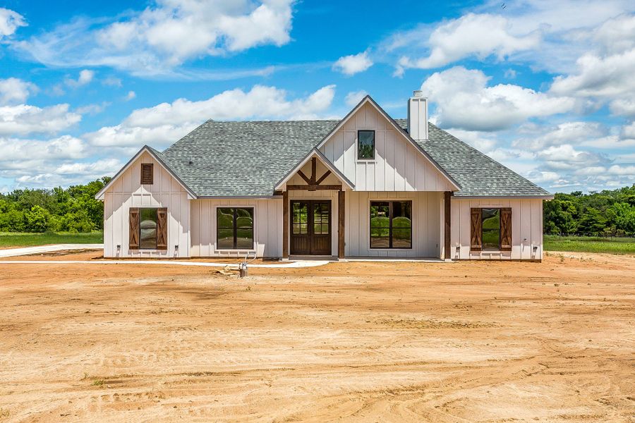 Representative exterior photo of a completed home built from the Abrams by Trinity Classic Homes in Freeman Ranch, Weatherford, TX (Image 24).