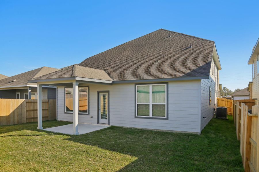 Exterior details and patio area of a home in Landing Meadows - Premier Series, New Caney (Image 2). Exterior details and patio area of a home in Landing Meadows - Premier Series, New Caney (Image 2).