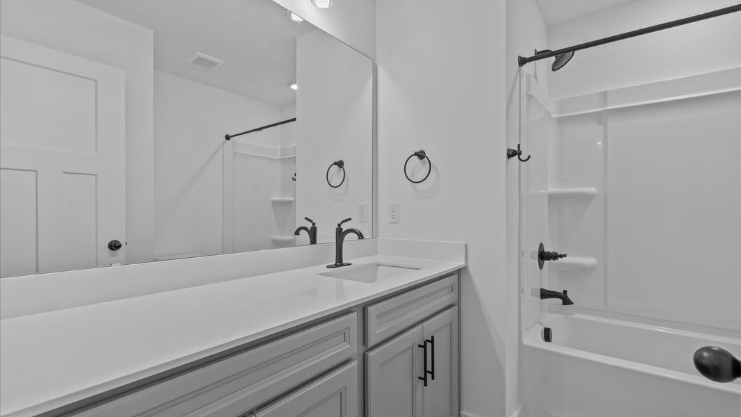 Stylish guest bathroom with superior design and thoughtful storage solutions