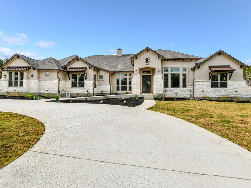 Representative exterior photo of a completed home built from the Coronado I by Giddens Homes in Clearwater Ranch, Liberty Hill, TX (Image 34).