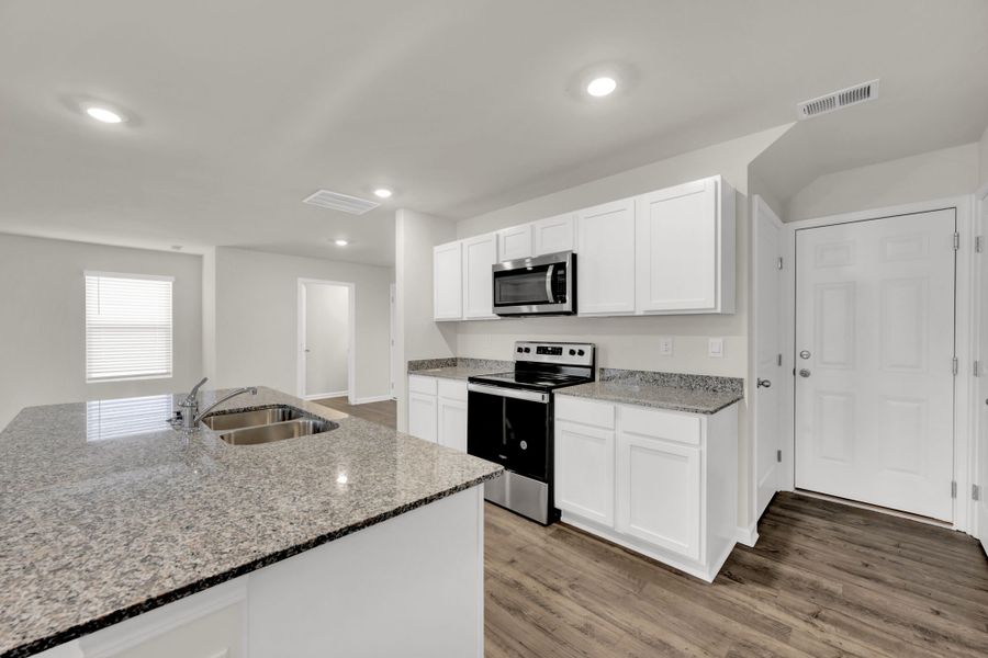 Representative furnished interior of a home built from the Aisle by D.R. Horton in Hawk's Ridge, Rossville (Image 4). Representative furnished interior of a home built from the Aisle by D.R. Horton in Hawk's Ridge, Rossville (Image 4).