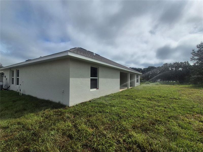 Front exterior of a new home in Hill Country Estates, Dade City, FL, highlighting curb appeal (Image 26).