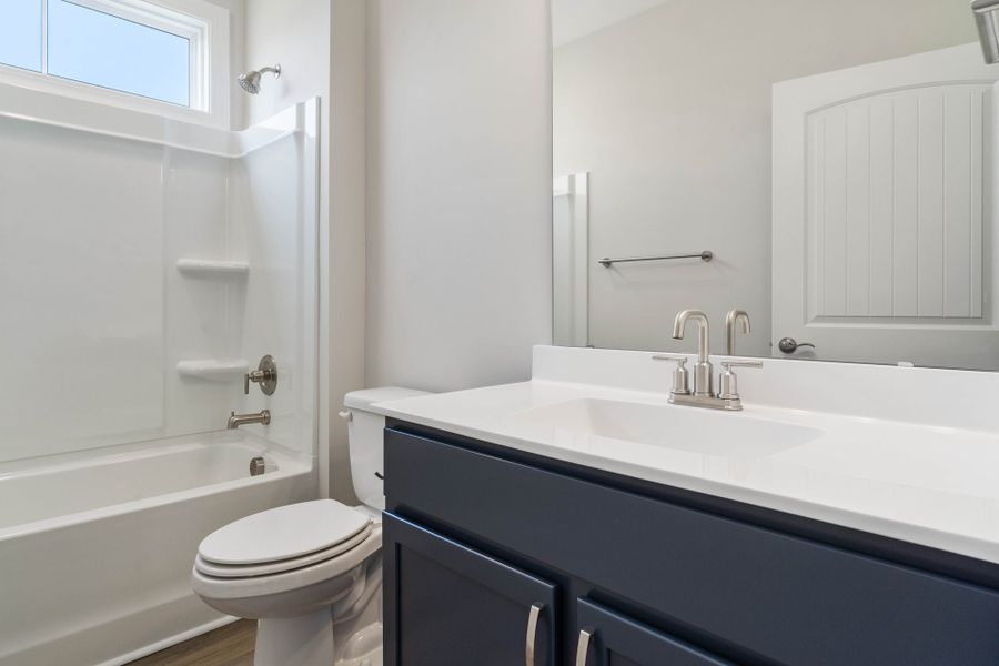 Furnished interior in a model home at Waterbridge in Myrtle Beach (Image 20).