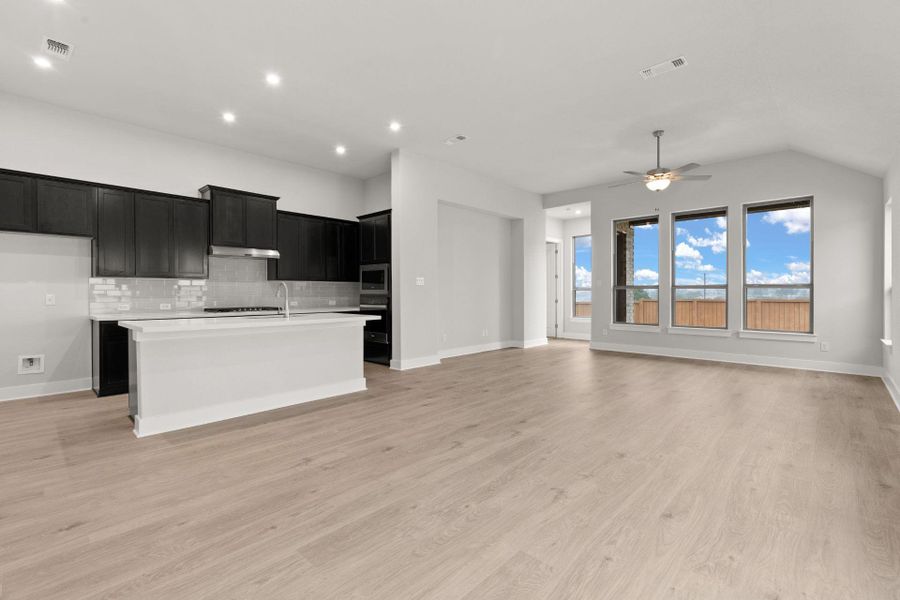 Family Room to Open Concept Kitchen - Representative Photo