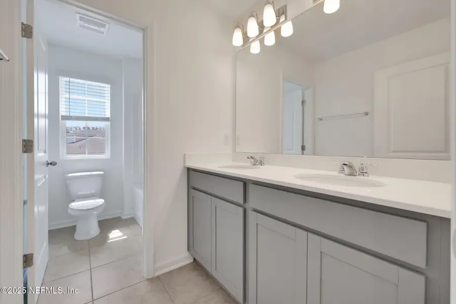 Furnished interior view inside a new home in Amberly, Green Cove Springs (Image 8).