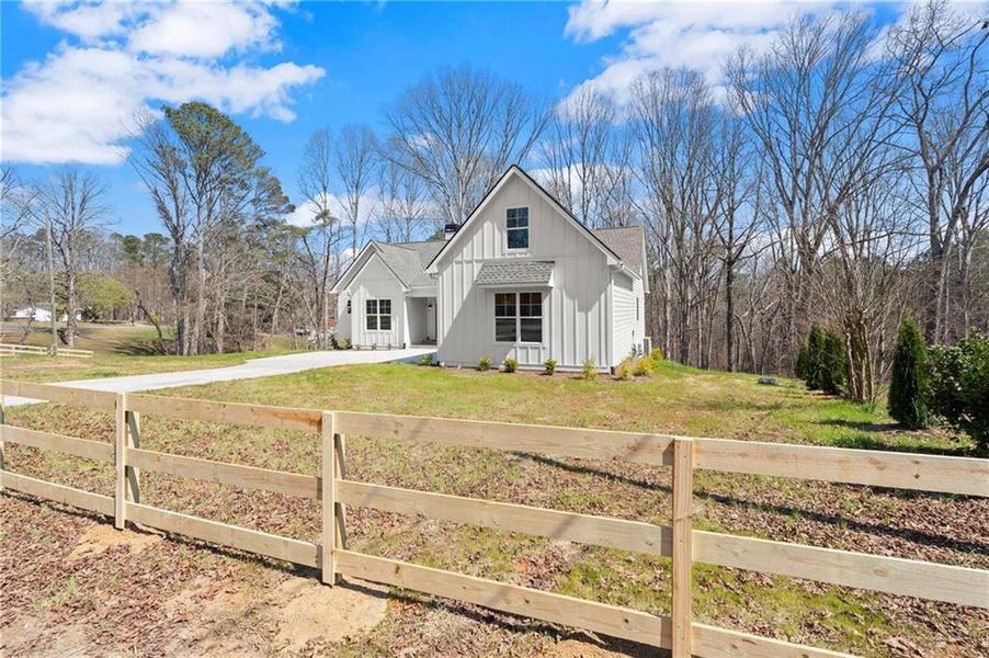 Front exterior of a new home in , Waleska, GA, highlighting curb appeal (Image 19). Front exterior of a new home in , Waleska, GA, highlighting curb appeal (Image 19).