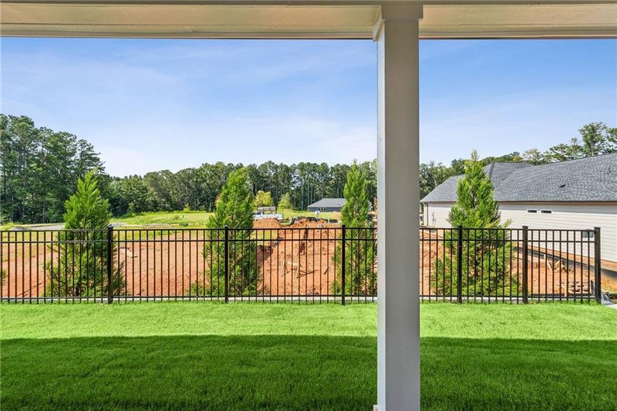 Exterior details and patio area of a home in Maple Grove at Towne Lake, Woodstock (Image 3).