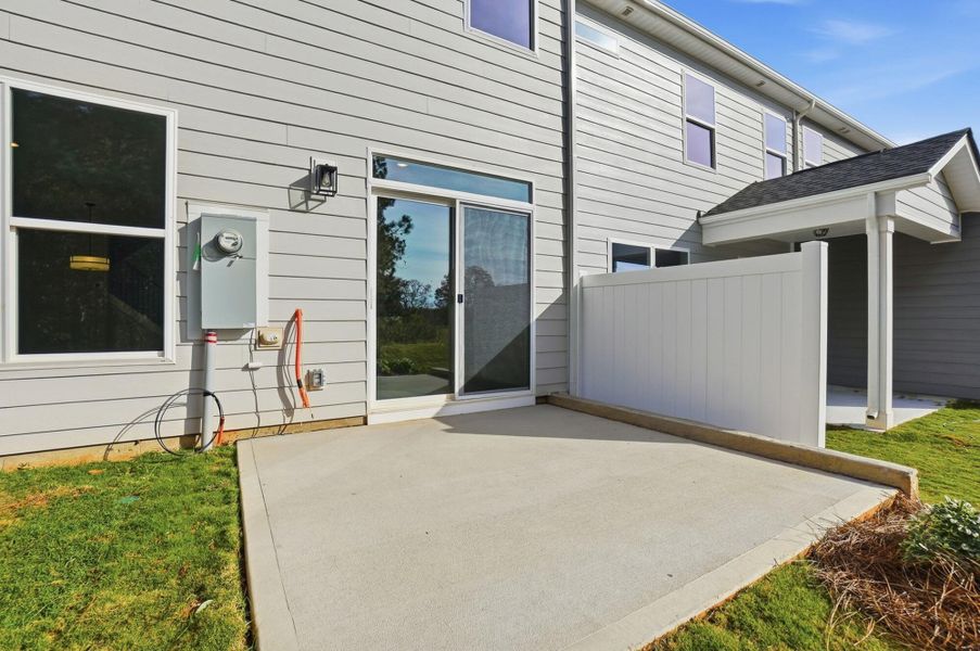 Exterior details and patio area of a home in Blythe Mill Townhomes, Waxhaw (Image 24). Exterior details and patio area of a home in Blythe Mill Townhomes, Waxhaw (Image 24).