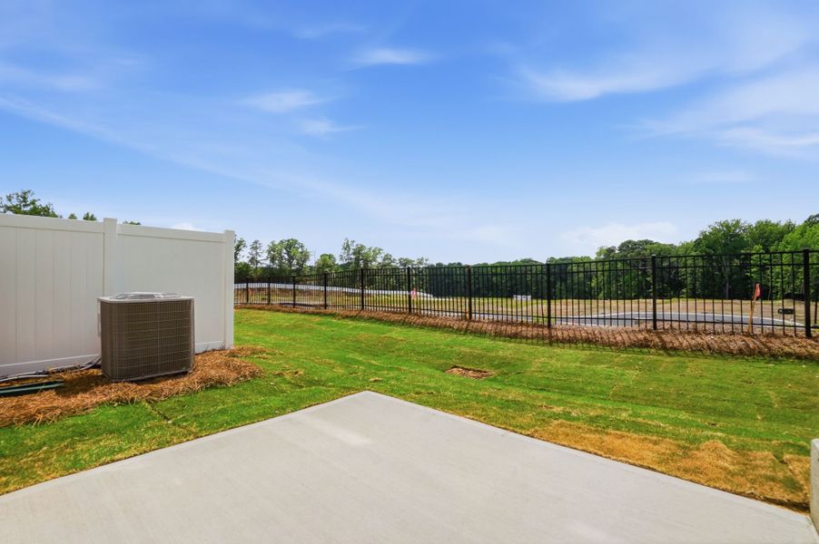Exterior details and patio area of a home in Stonesummit at Reedy Creek, Charlotte (Image 3).