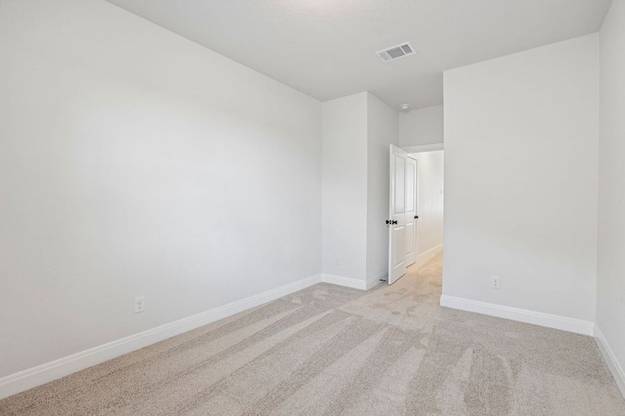 Spacious, unfurnished interior of a new home in 6 Creeks, Kyle (Image 22).