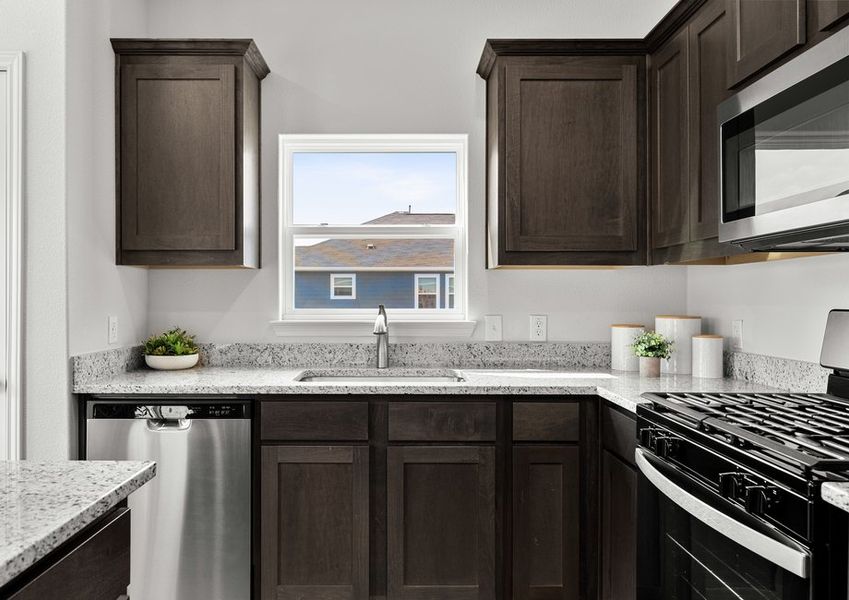 The kitchen has beautiful wood cabinetry. The kitchen has beautiful wood cabinetry.