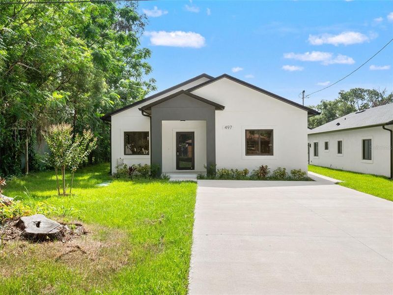 Front exterior of a new home in , Apopka, FL, highlighting curb appeal (Image 1). Front exterior of a new home in , Apopka, FL, highlighting curb appeal (Image 1).