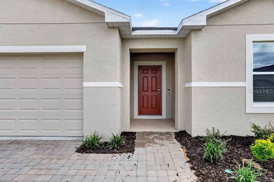 Exterior details and patio area of a home in Waterstone, Groveland (Image 34).