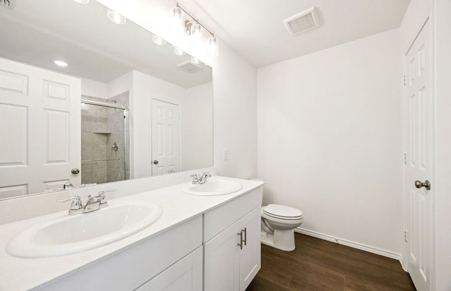Representative furnished interior of a home built from the Monroe by Centex in Ashford Crossing, Princeton (Image 9).