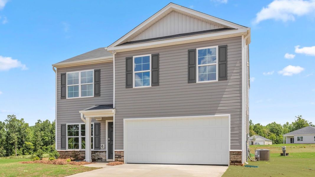 Front exterior of a new home in Madeline Farm, New Bern, NC, highlighting curb appeal (Image 17).