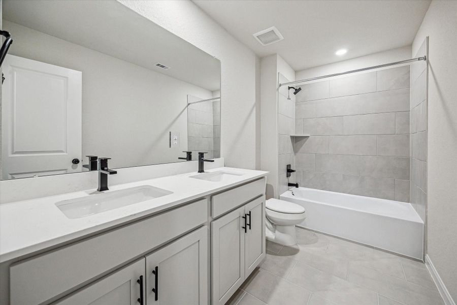 Furnished interior view inside a new home in Elyson, Katy (Image 15).