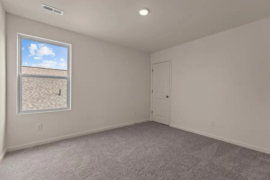 Representative unfurnished interior of a home built from the Beacon by Starlight Homes in Wilson's Walk, Clayton (Image 21).
