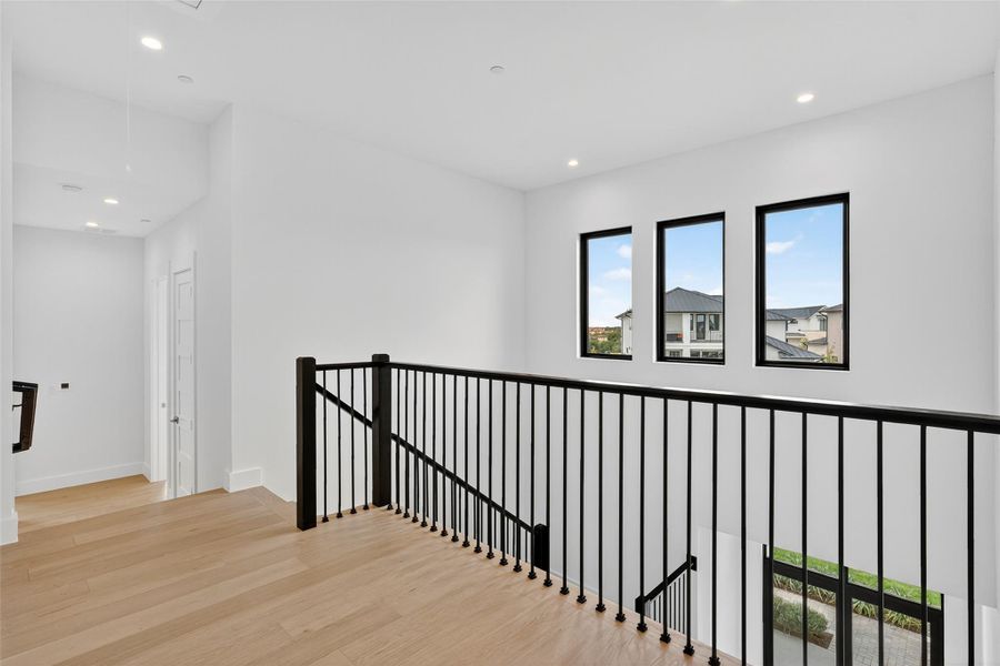 Spacious, unfurnished interior of a new home in Milky Way at River Place, Austin (Image 21).