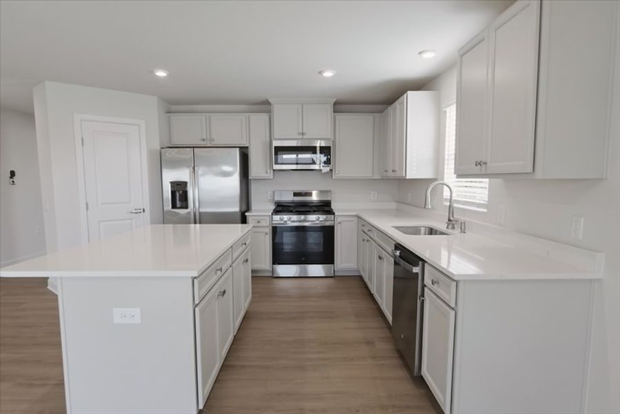 Furnished interior view inside a new home in Reidville Town Center Cottages, Duncan (Image 7).