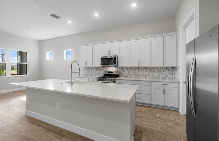 Furnished interior view inside a new home in Del Webb Oak Creek, North Fort Myers (Image 11).