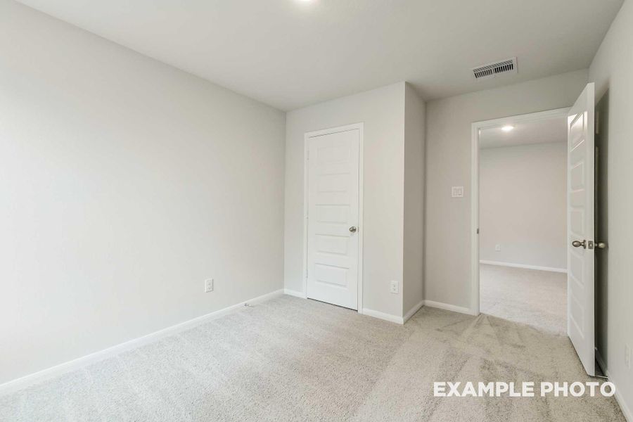 Spacious, unfurnished interior of a new home in Caney Creek Place, Conroe (Image 23).