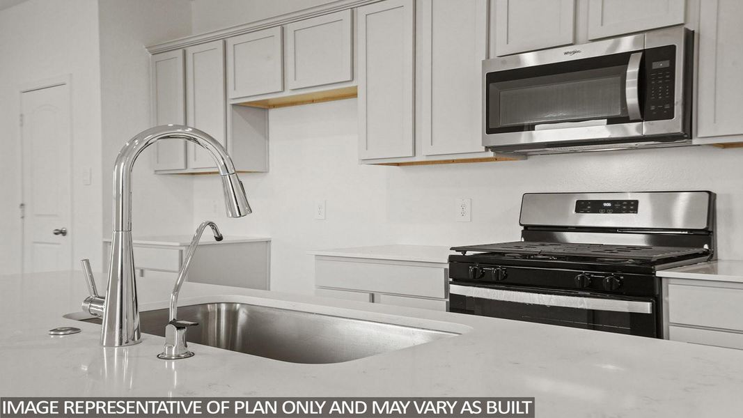 Close-up of interior finishes inside a home in Sunterra, Katy (Image 9).