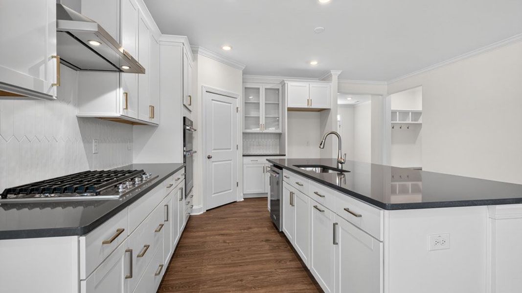 Furnished interior view inside a new home in The Estates Park, Apex (Image 6).