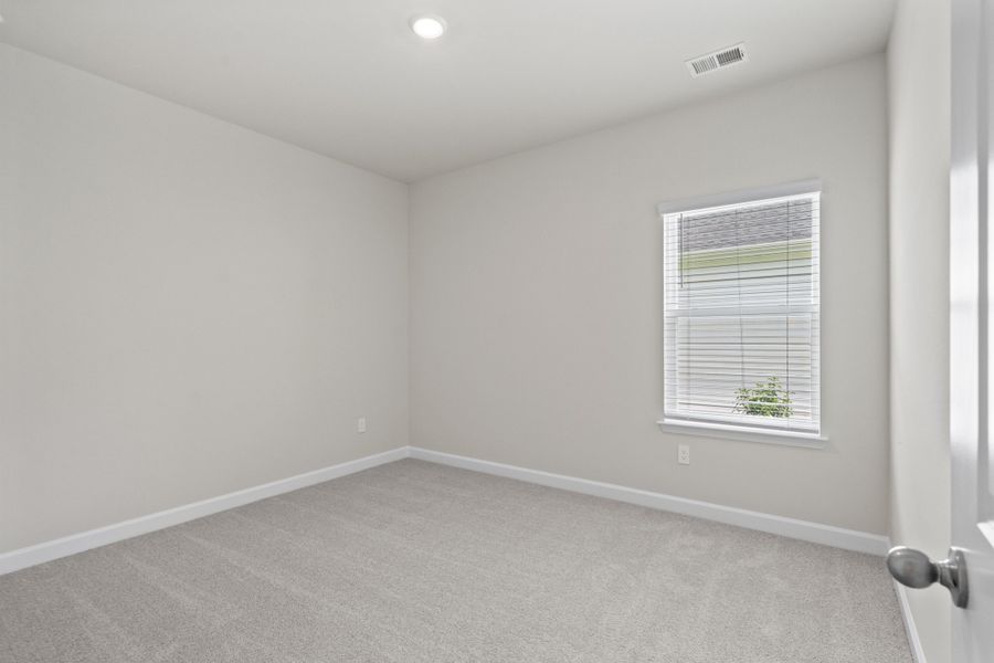 Spacious, unfurnished interior of a new home in Cypress Ridge - The Coastline Series, Longs (Image 26).