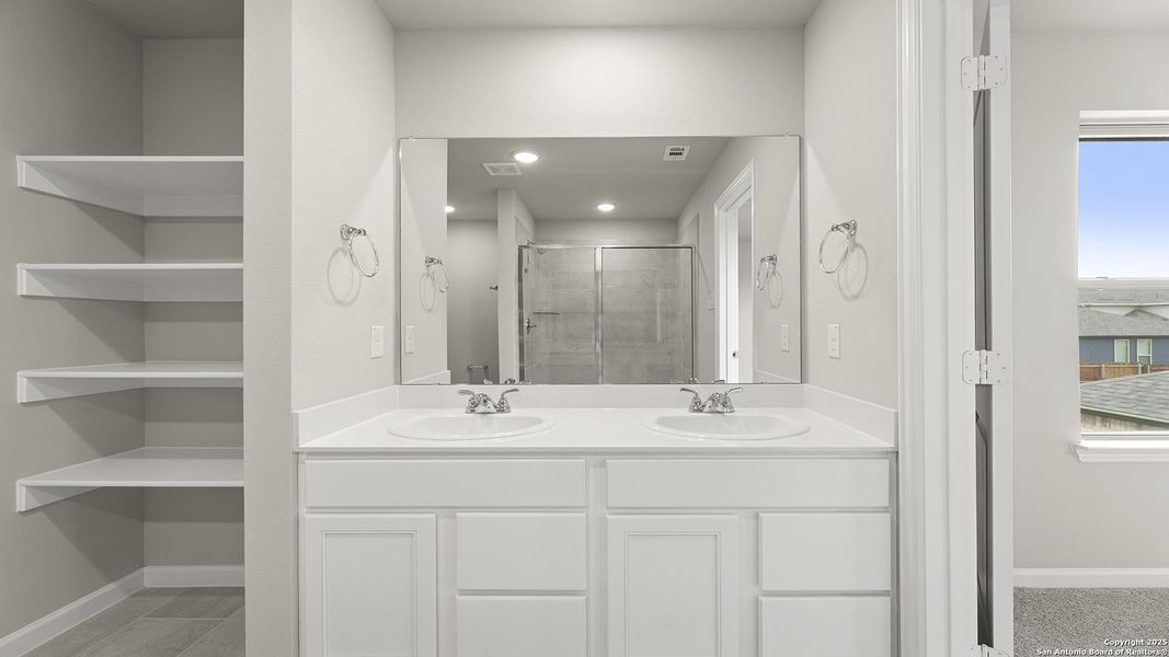 Furnished interior view inside a new home in Fairway Crossing 40s, San Antonio (Image 13).