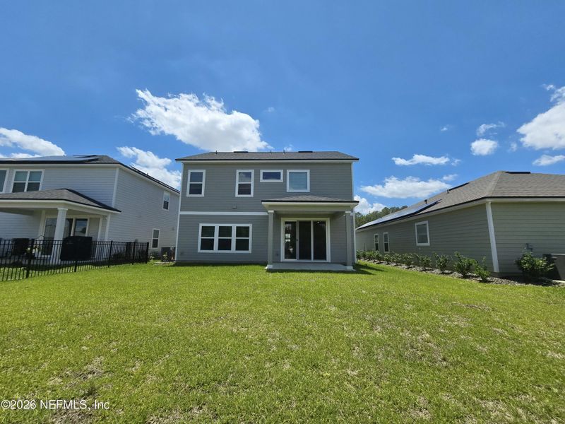 Exterior details and patio area of a home in Hyland Trail, Green Cove Springs (Image 37).