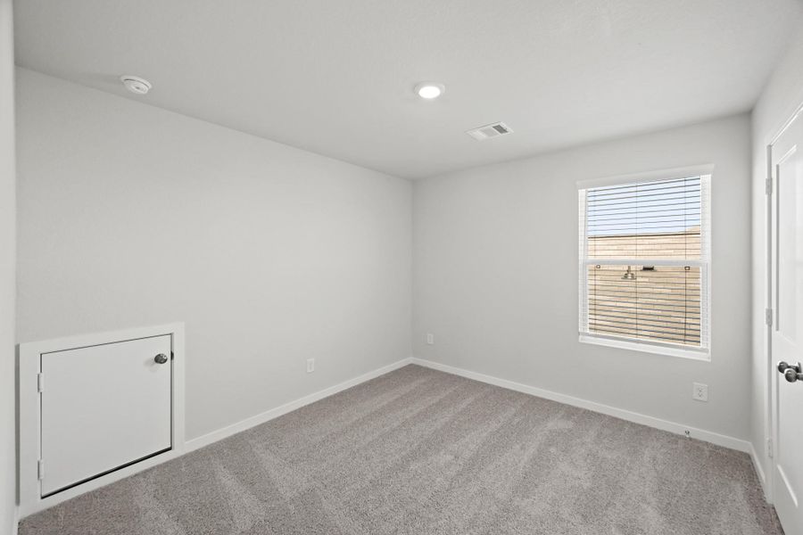 Spacious, unfurnished interior of a new home in Lonestar Collection at Paloma at Sanford Farms, Waller (Image 32).