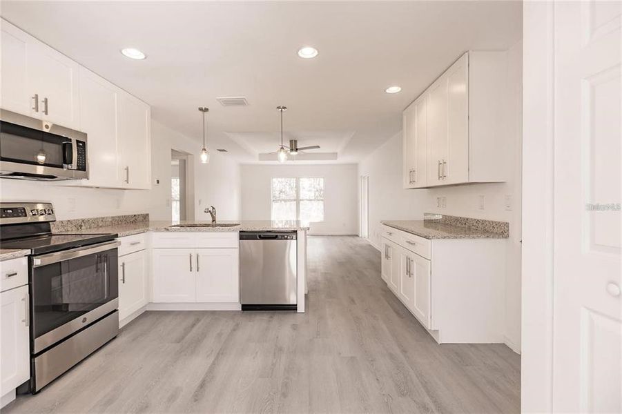 Furnished interior view inside a new home in , Punta Gorda (Image 10).
