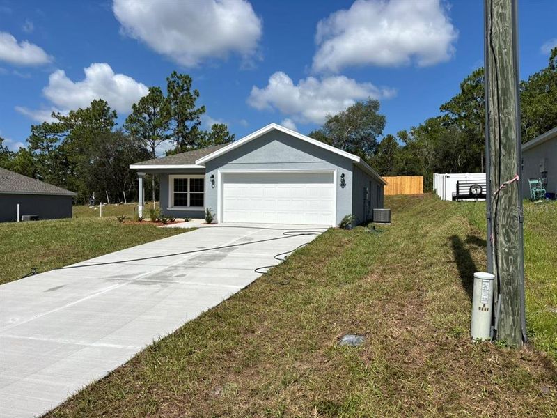 Front exterior of a new home in , Dunnellon, FL, highlighting curb appeal (Image 20). Front exterior of a new home in , Dunnellon, FL, highlighting curb appeal (Image 20).