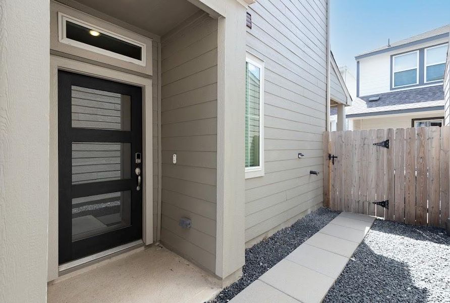 Exterior details and patio area of a home in , Houston (Image 4). Exterior details and patio area of a home in , Houston (Image 4).
