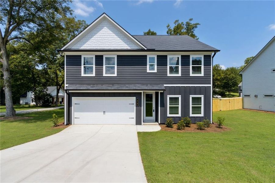 Front exterior of a new home in , Hoschton, GA, highlighting curb appeal (Image 27). Front exterior of a new home in , Hoschton, GA, highlighting curb appeal (Image 27).