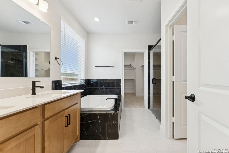 Furnished interior view inside a new home in Davis Ranch 50', San Antonio (Image 11).