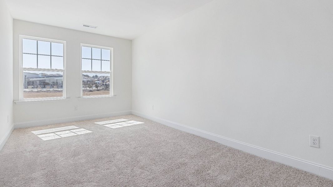 Furnished interior view inside a new home in Sidney Creek Townhomes, Zebulon (Image 18).