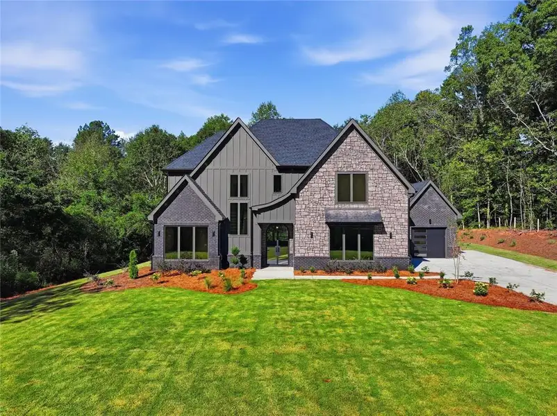 Front exterior of a new home in , Gainesville, GA, highlighting curb appeal (Image 20).