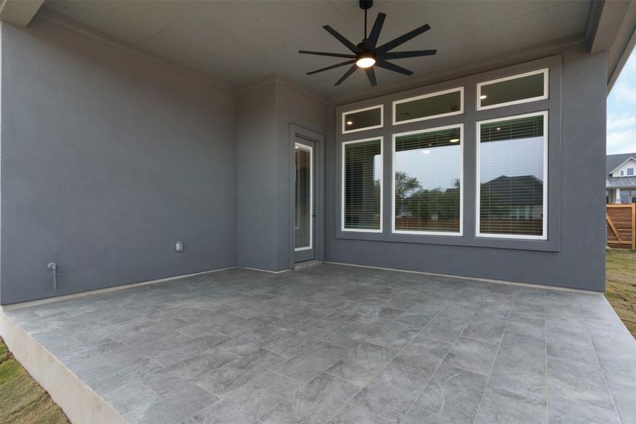 View of patio with ceiling fan
