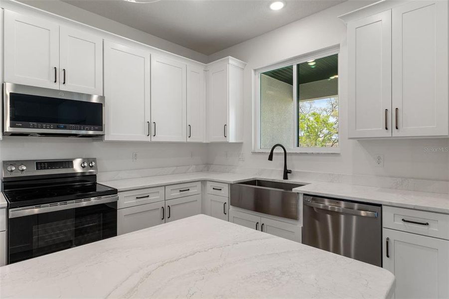 Furnished interior view inside a new home in , Weeki Wachee (Image 10).