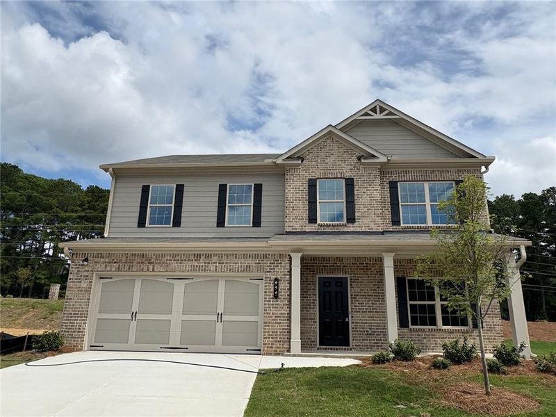 Front exterior of a new home in , Grayson, GA, highlighting curb appeal (Image 18).