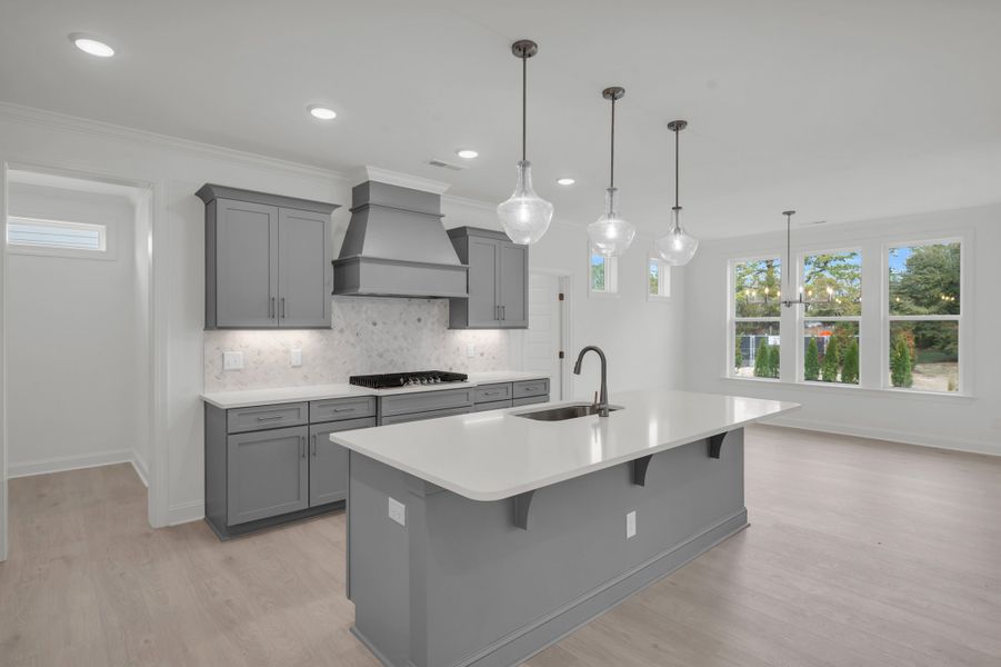 Representative furnished interior of a home built from the The Hampton by RobuckHomes in Windwater, Hampstead (Image 20).