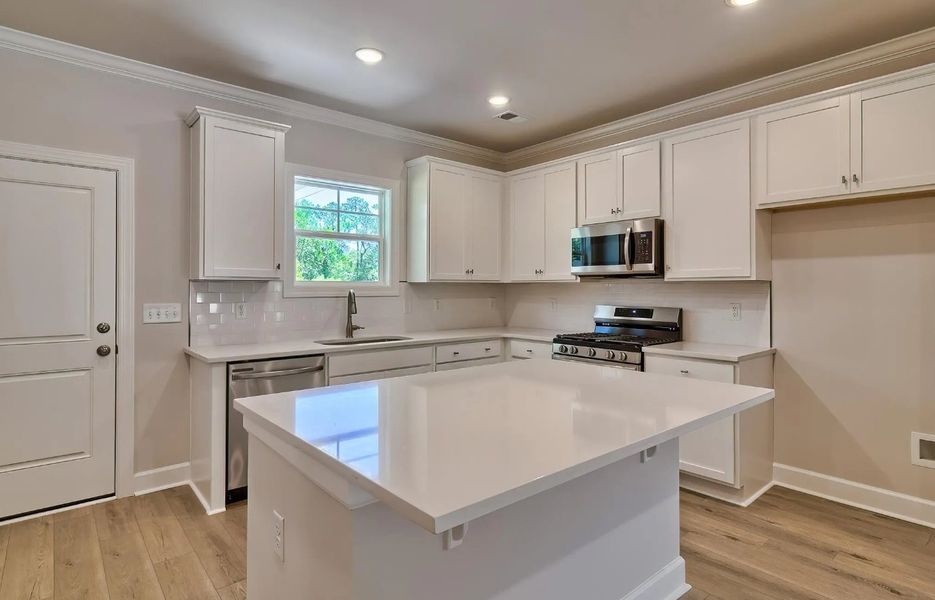 Furnished interior in a model home at Satchel Ford in Columbia (Image 7).