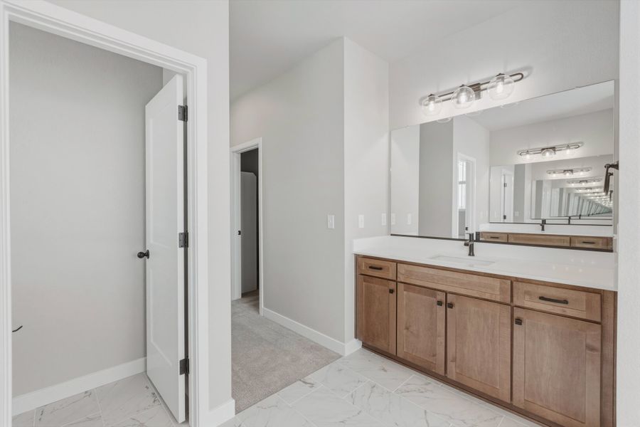 Furnished interior view inside a new home in The Aurora Highlands, Aurora (Image 10).