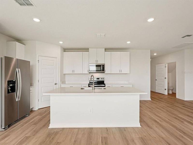 Furnished interior view inside a new home in Coasterra - Premier Series, Palmetto (Image 6).