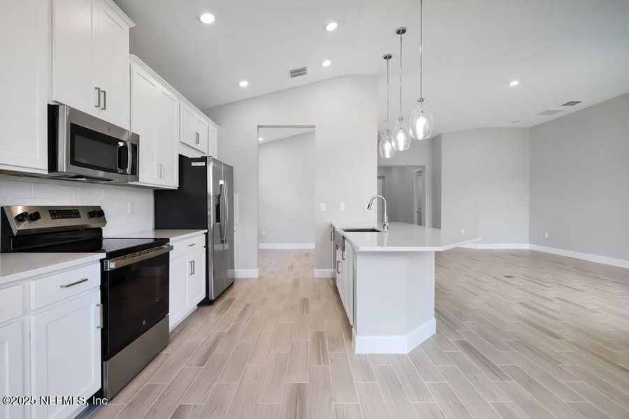 Furnished interior view inside a new home in Colbert Landings, Palm Coast (Image 5).