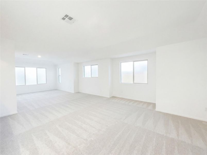 Spacious, unfurnished interior of a new home in The Colony, Bastrop (Image 29).